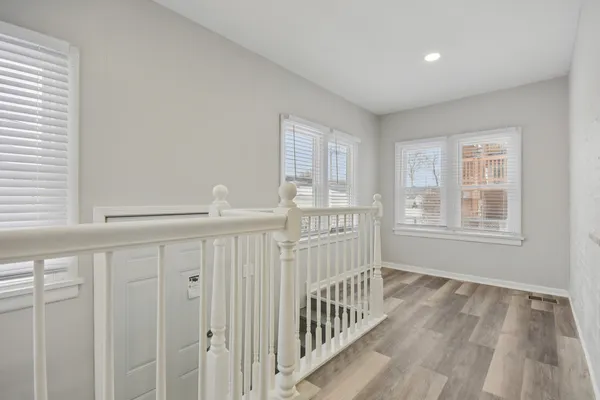 a view of a livingroom with wooden floor