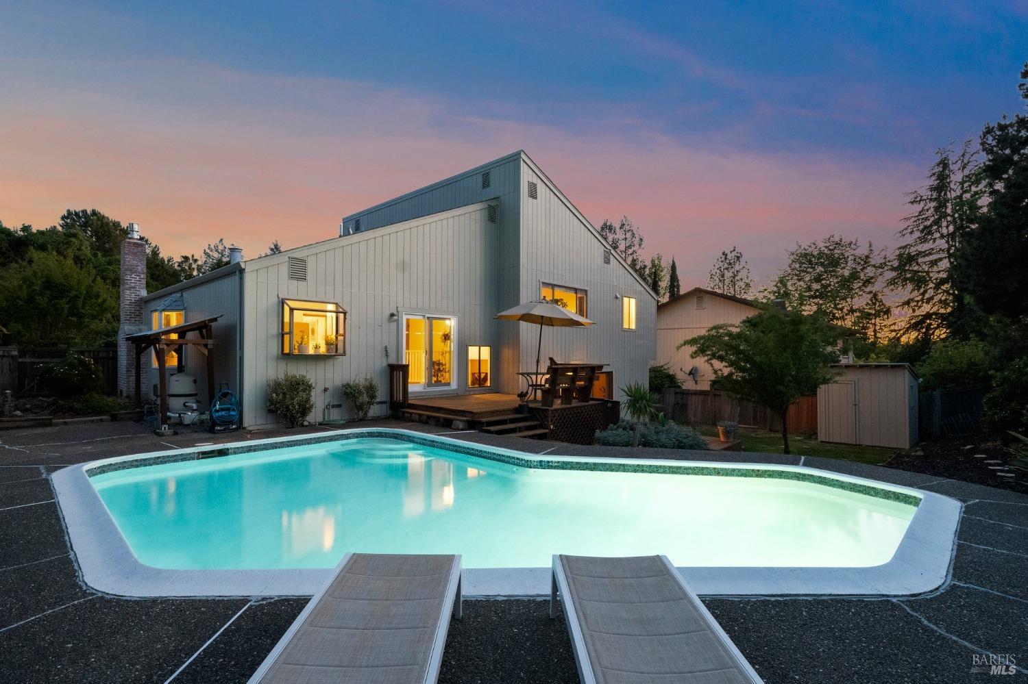 5405 Spain Avenue Santa Rosa, CA 95409 - Photo 1 of 1 a view of a swimming pool with a patio