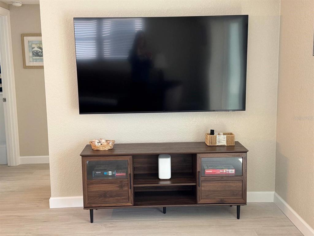 6154 Midnight Pass Road, Unit C15 Sarasota, FL 34242 - Photo 6 of 9 a bathroom with a sink and a mirror