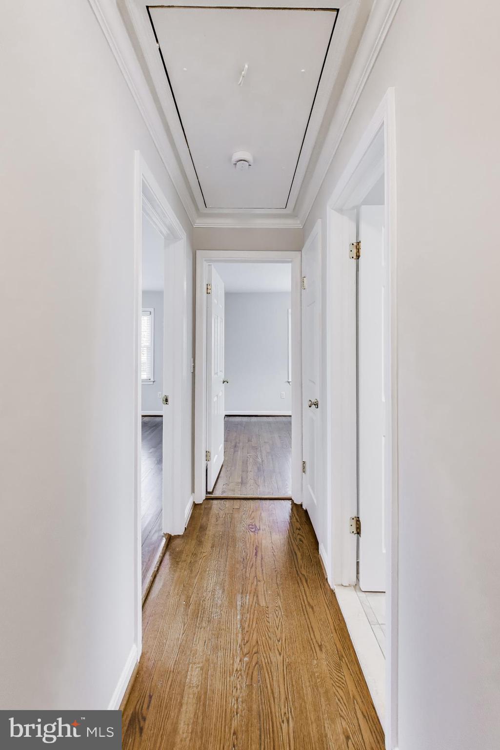 5300 Easton Drive Springfield, VA 22151 - Photo 14 of 60 a view of a room with wooden floor and a hallway