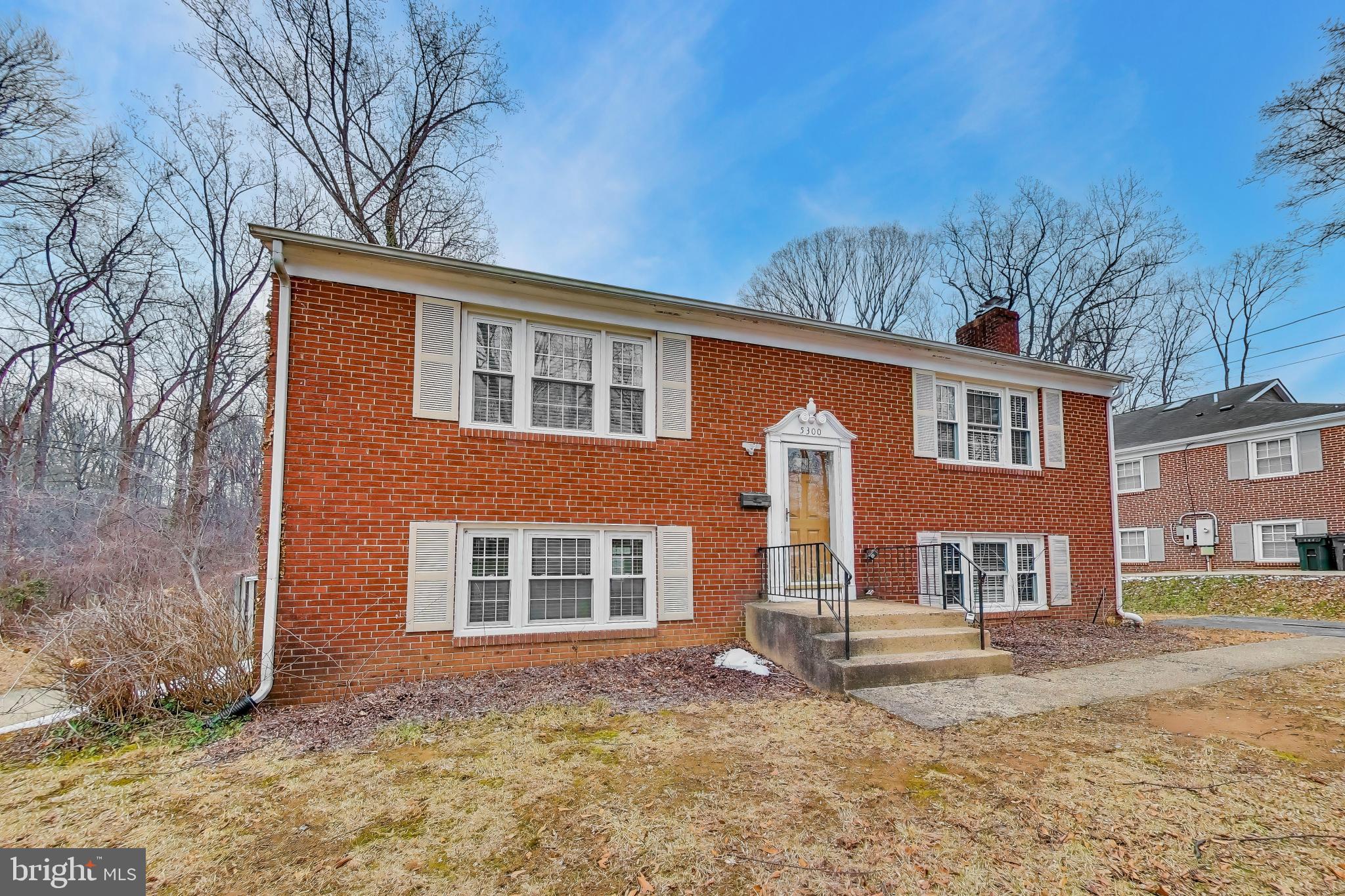5300 Easton Drive Springfield, VA 22151 - Photo 2 of 60 a front view of a house with a yard