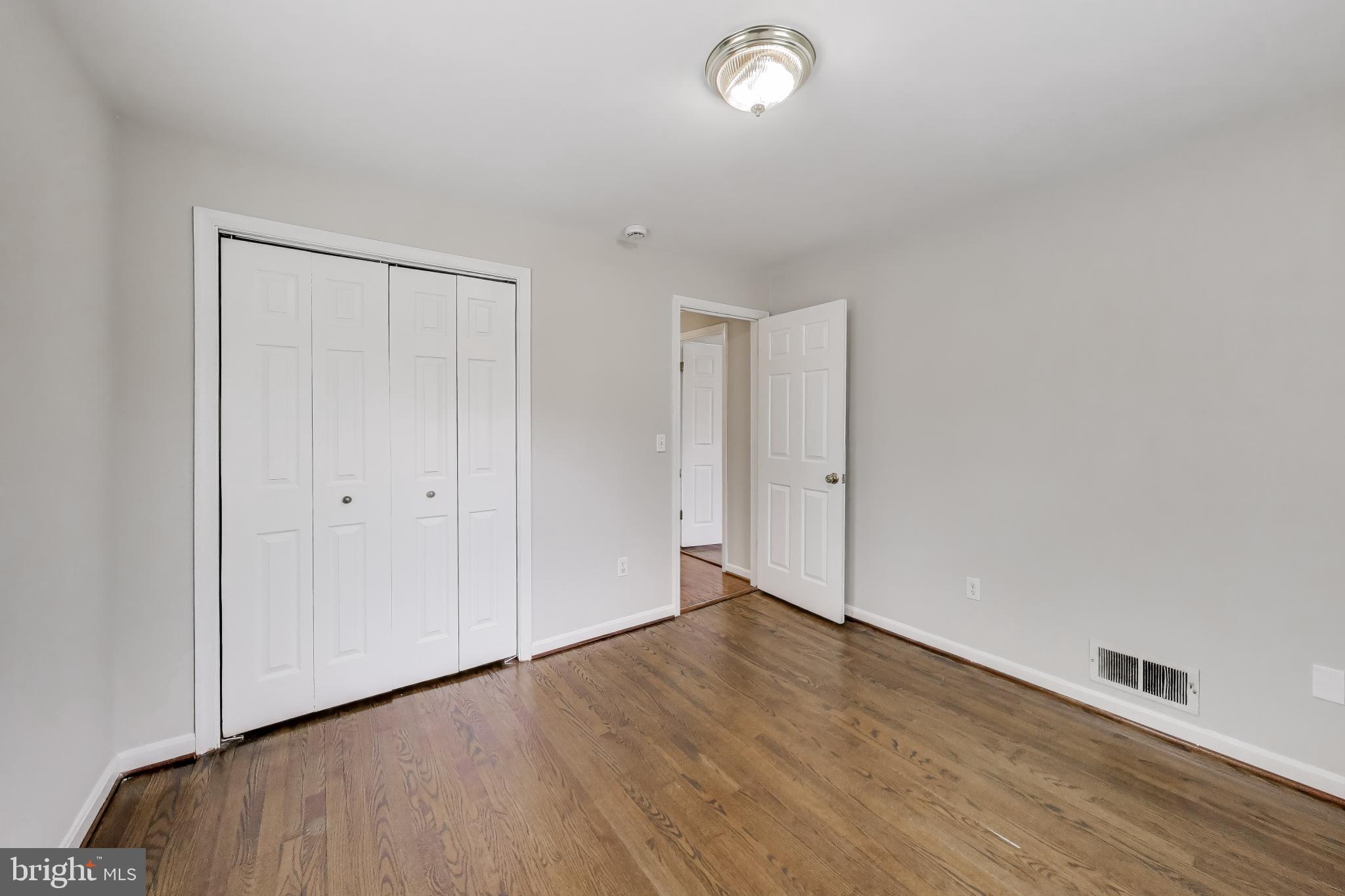 5300 Easton Drive Springfield, VA 22151 - Photo 21 of 60 a view of an empty room with wooden floor