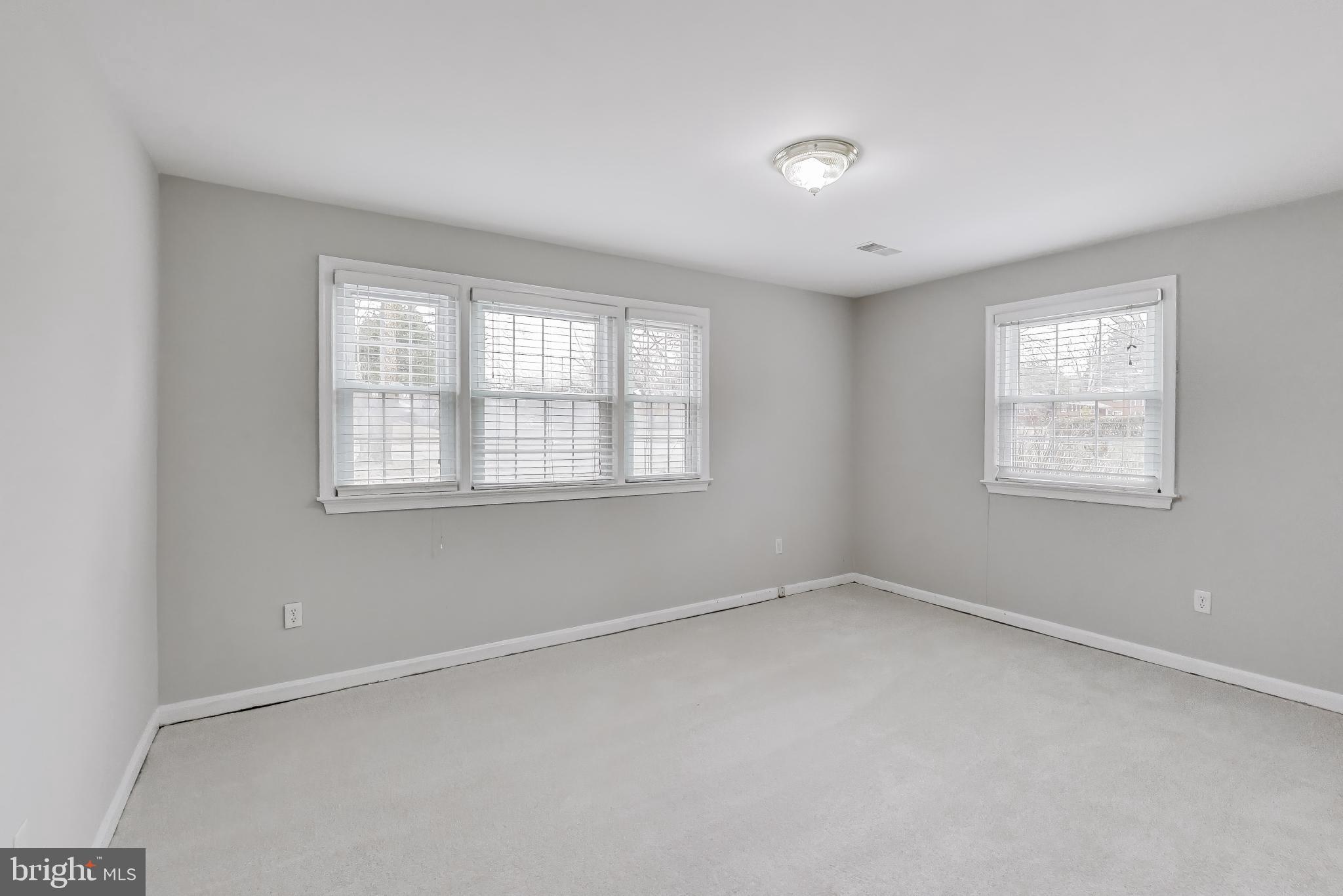 5300 Easton Drive Springfield, VA 22151 - Photo 31 of 60 an empty room with windows