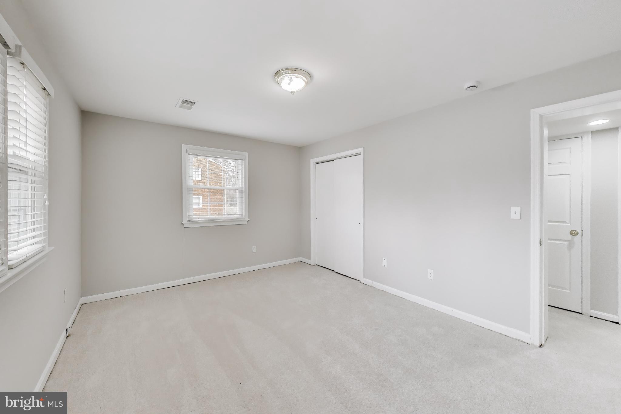 5300 Easton Drive Springfield, VA 22151 - Photo 32 of 60 an empty room with windows