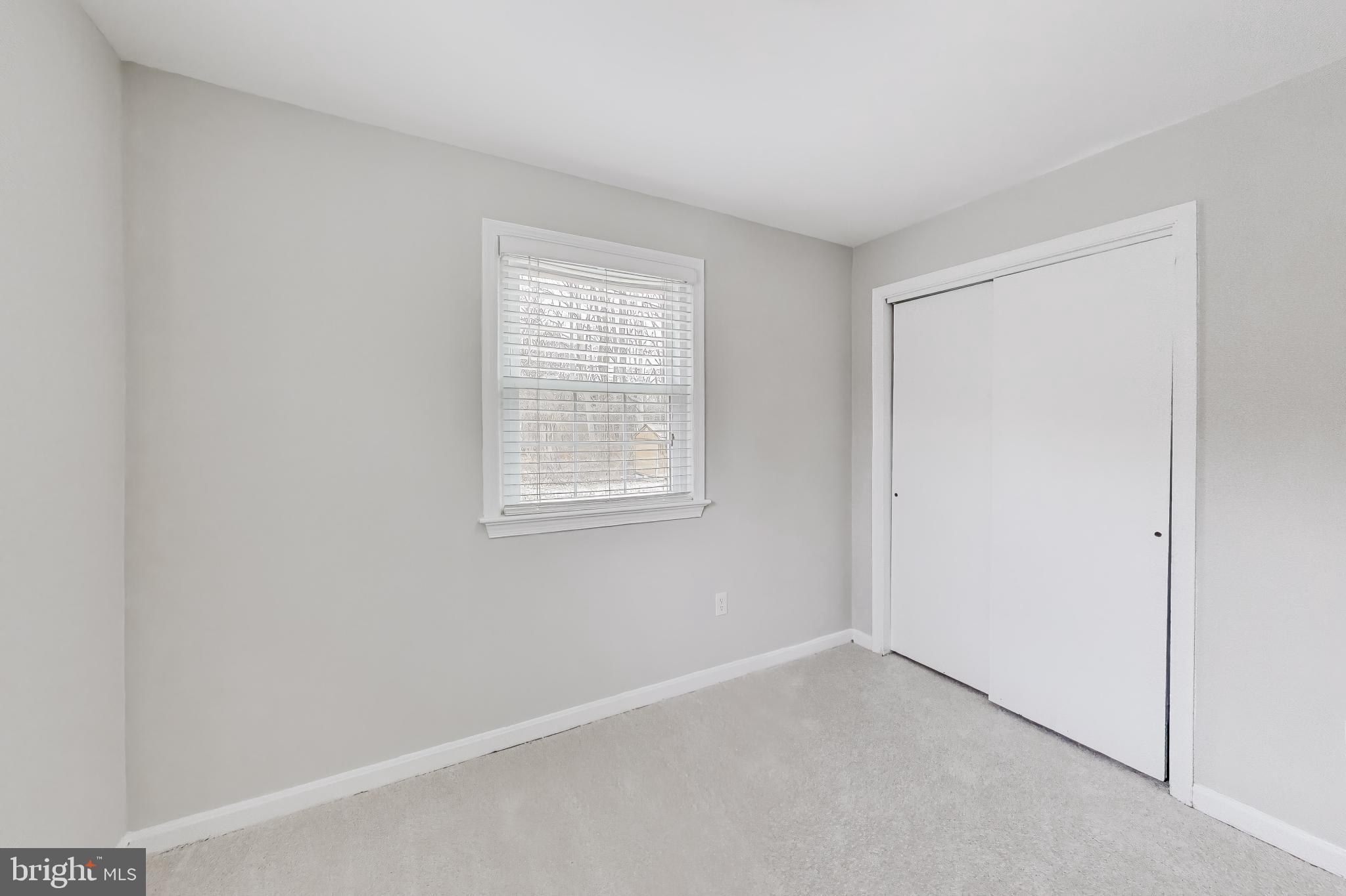 5300 Easton Drive Springfield, VA 22151 - Photo 36 of 60 an empty room with windows
