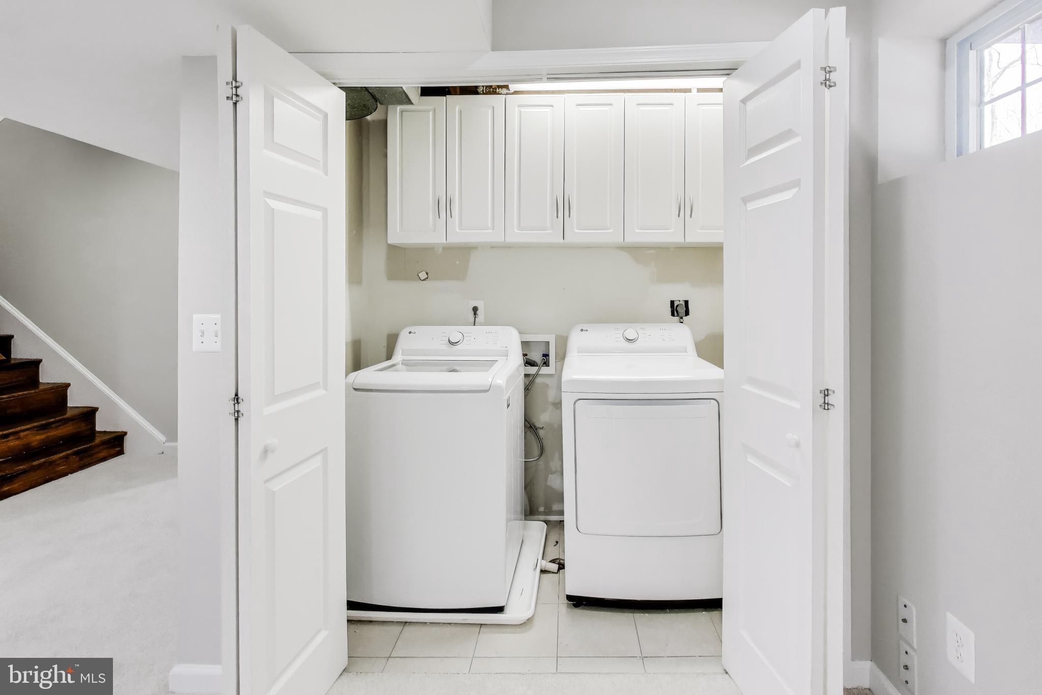 5300 Easton Drive Springfield, VA 22151 - Photo 42 of 60 a utility room with dryer and washer
