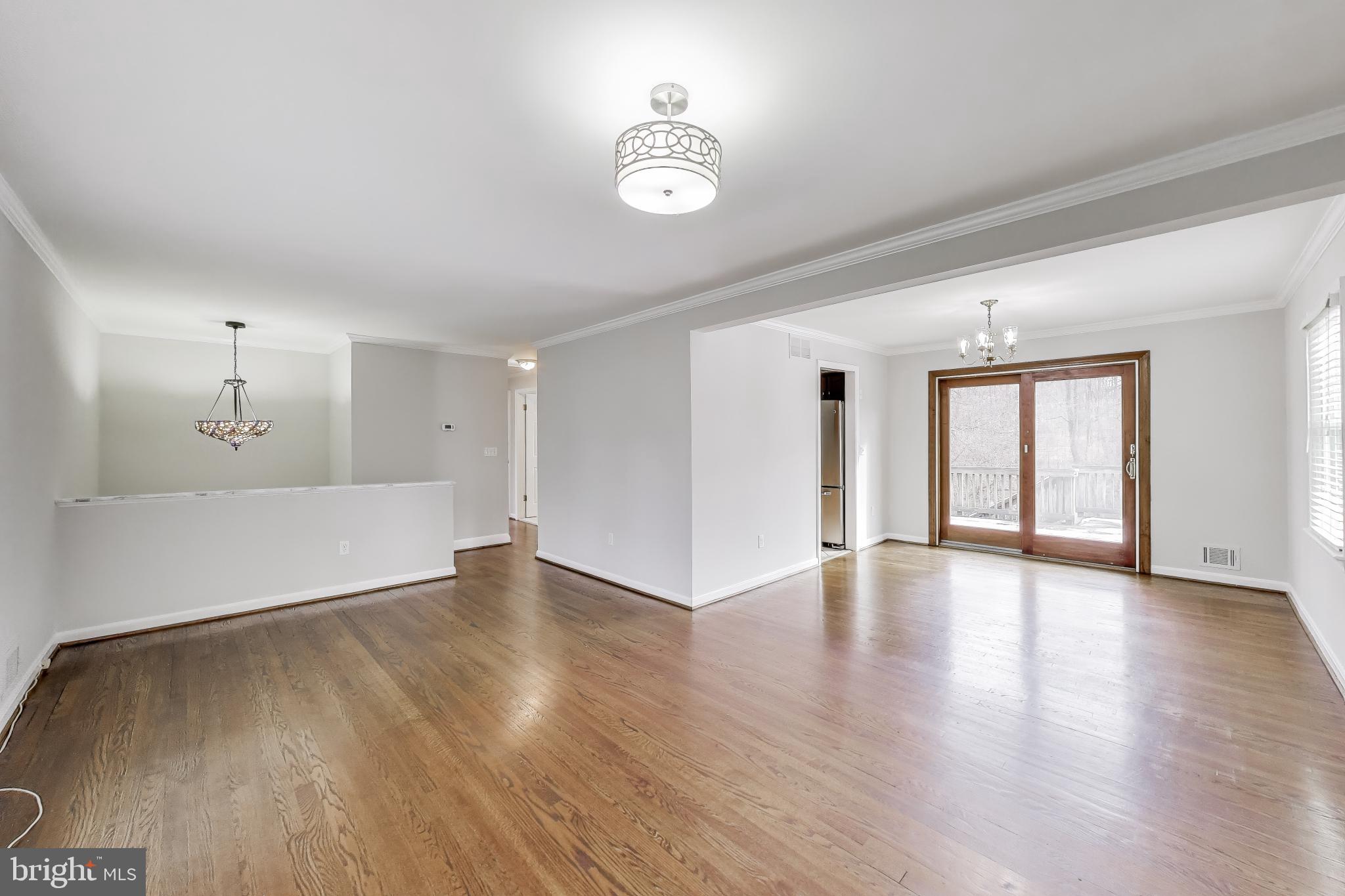 5300 Easton Drive Springfield, VA 22151 - Photo 7 of 60 a view of an empty room with window and wooden floor