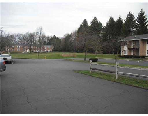 61 Darlington Road, Unit A 22 Beaver Falls, PA 15010 - Photo 13 of 18 Parking Lot/Garage. Uncrowded grassy common areas and parking lot.