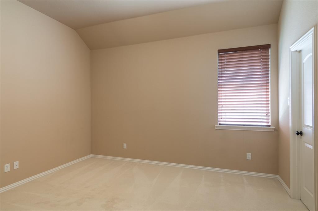 911 Panther Lane Allen, TX 75013 - Photo 16 of 20 a view of an empty room with a window