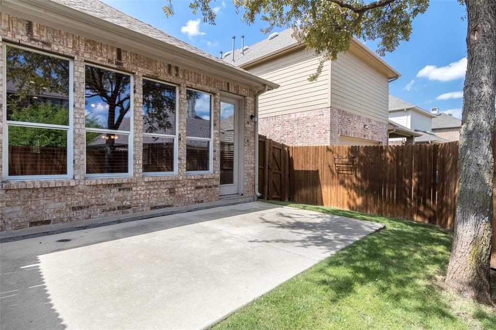 911 Panther Lane Allen, TX 75013 - Photo 20 of 20 a view of a house with a backyard