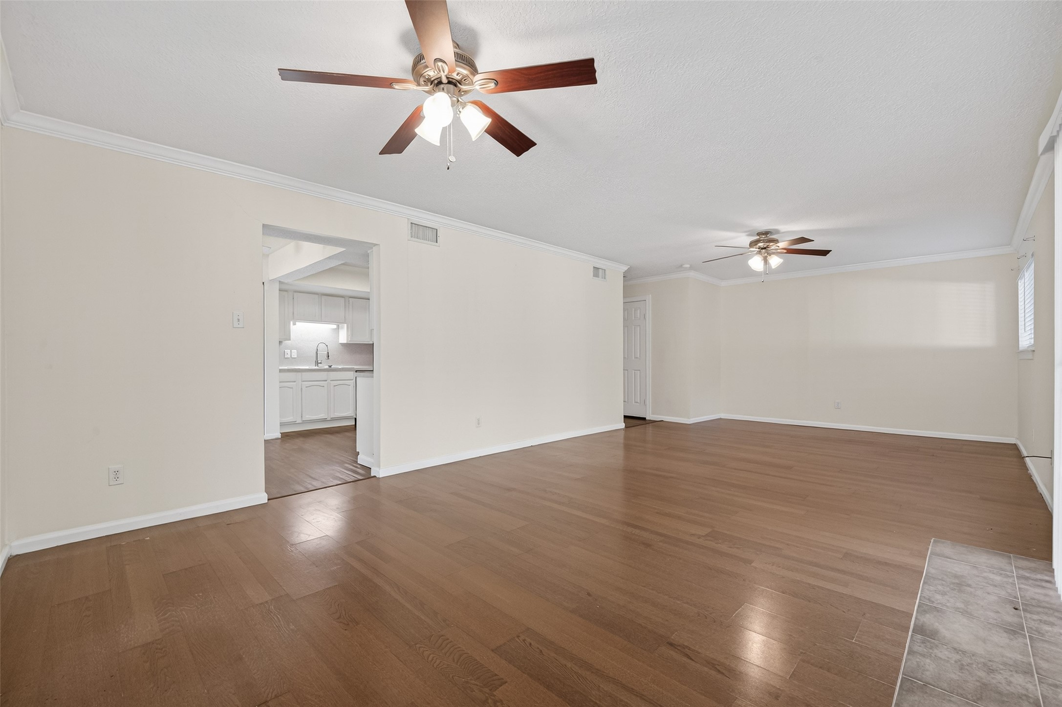 1106 East Red Cedar Circle Spring, TX 77380 - Photo 13 of 43 a view of empty room with wooden floor