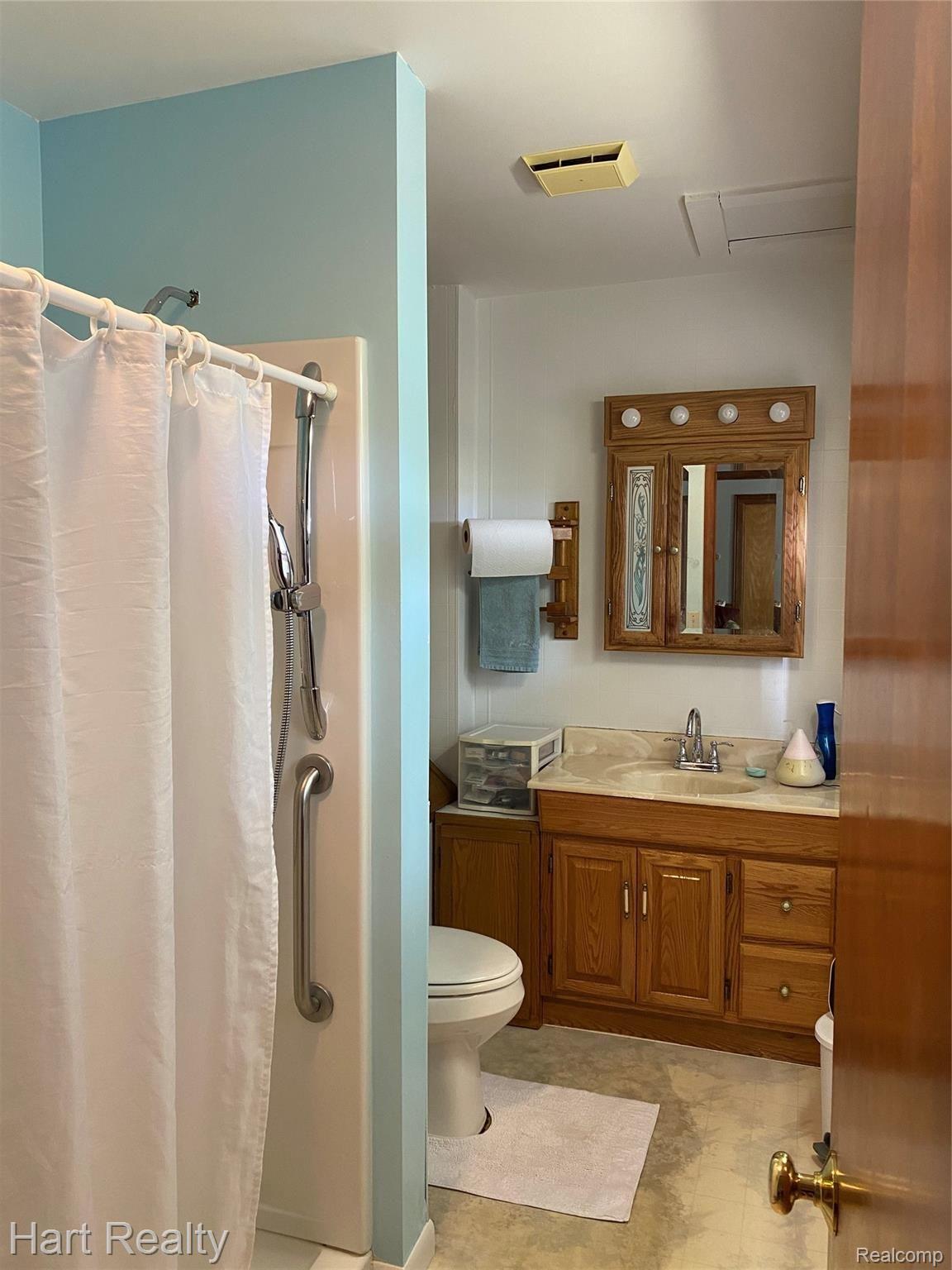 5910 Walker Road Marlette, MI 48453 - Photo 10 of 51 Main floor bathroom
