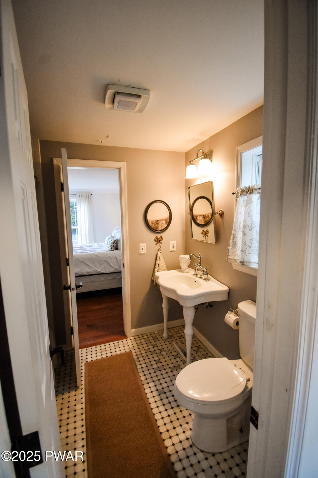 66 Wash Road Waymart, PA 18472 - Photo 17 of 41 a bathroom with a sink toilet and mirror