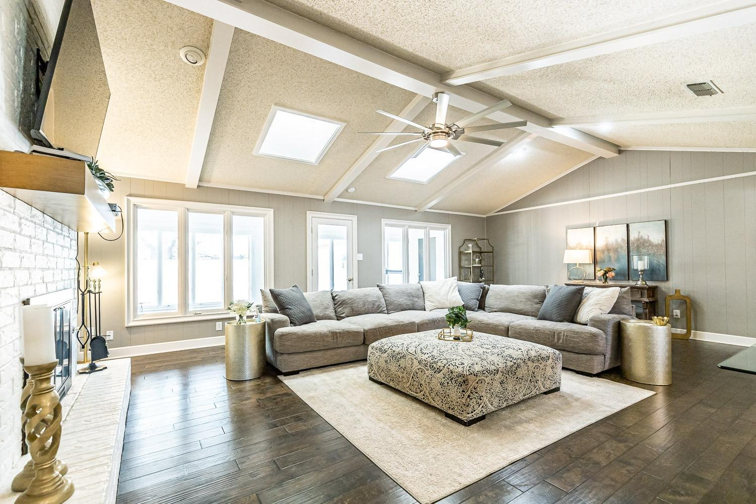 5720 68th Street Lubbock, TX 79424 - Photo 12 of 48 a living room with furniture and a large window