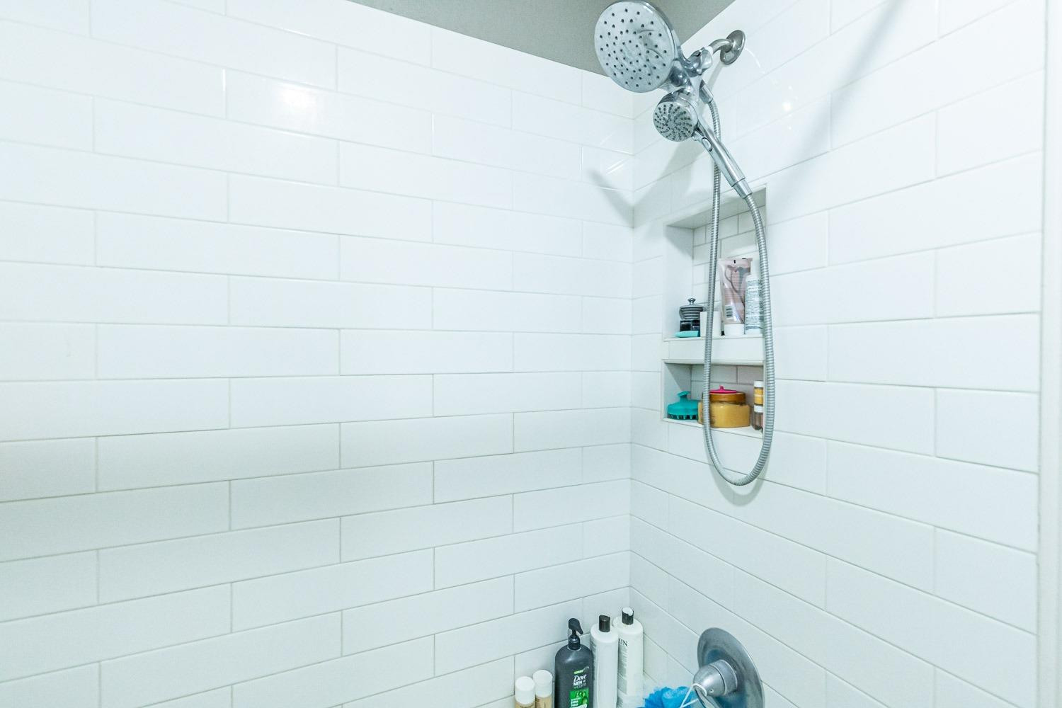 5720 68th Street Lubbock, TX 79424 - Photo 23 of 48 a bathroom with a shower