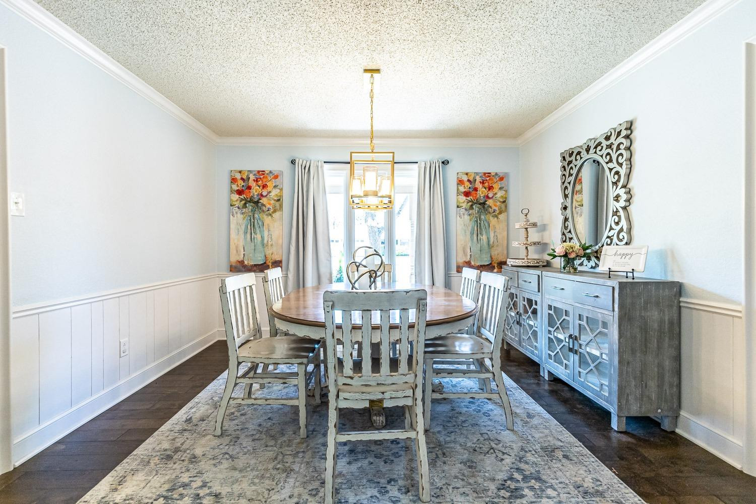 5720 68th Street Lubbock, TX 79424 - Photo 6 of 48 a view of a dining room with furniture window and outside view
