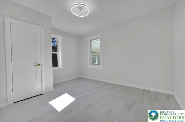 a picture of a bathroom with mirror