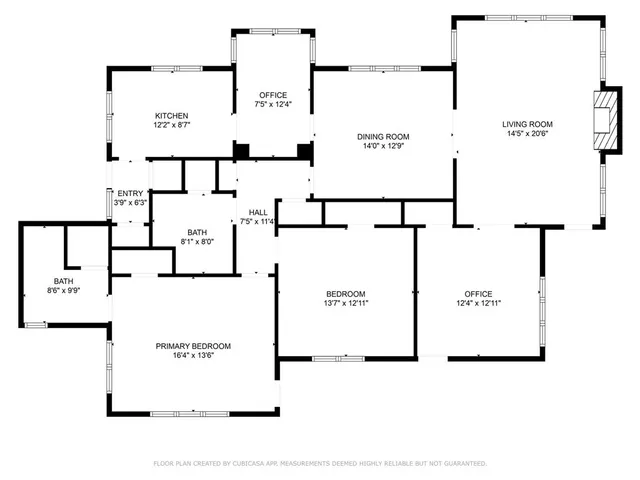 a living room with granite countertop furniture and floor to ceiling windows