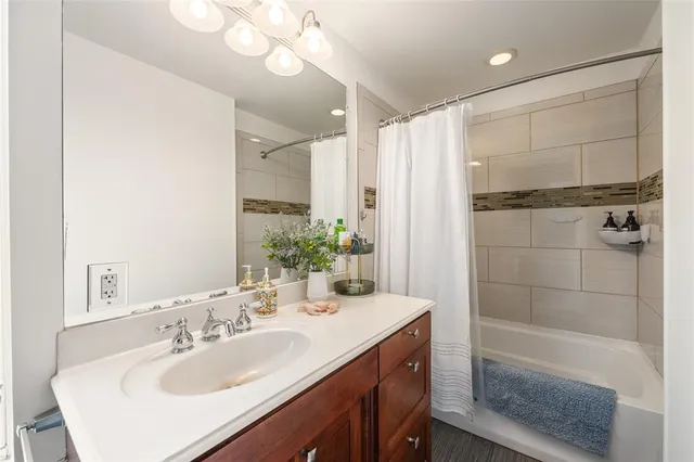 a view of a house with swimming pool and sitting area