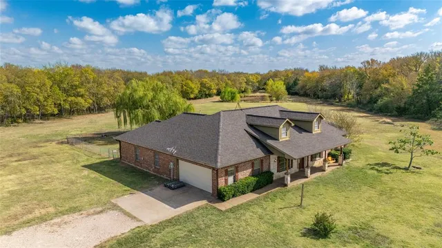 a view of a terrace with a yard