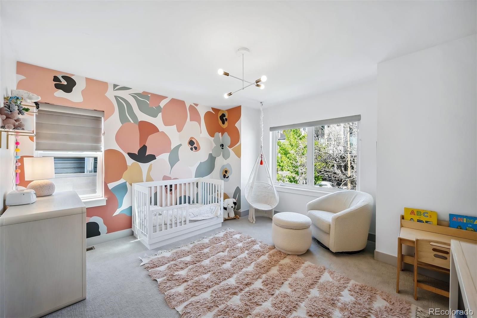 3536 Tejon Street Denver, CO 80211 - Photo 16 of 33 a spacious bedroom with a bed and a window