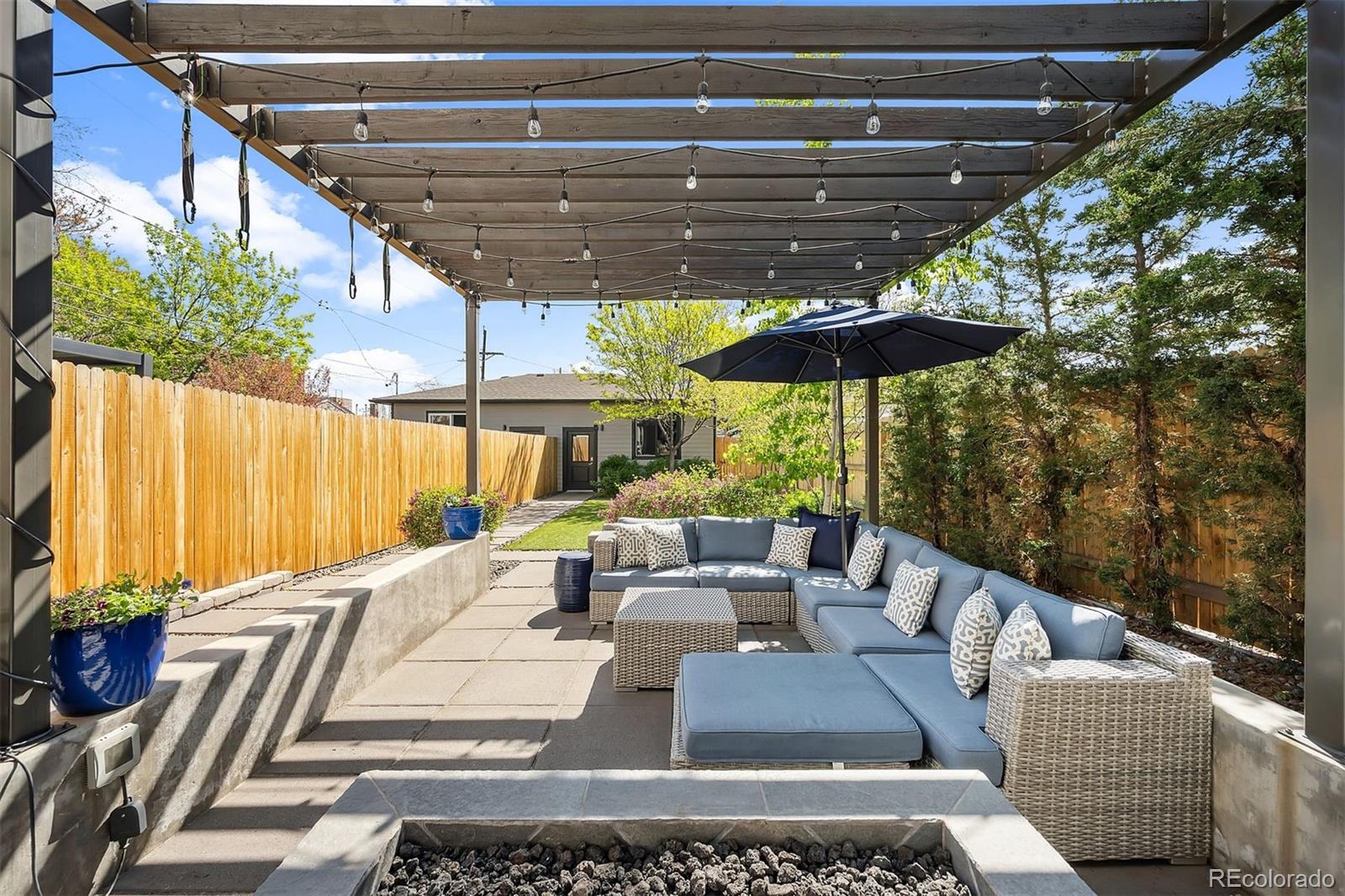 3536 Tejon Street Denver, CO 80211 - Photo 28 of 33 a view of a patio with couches chairs and a potted plant
