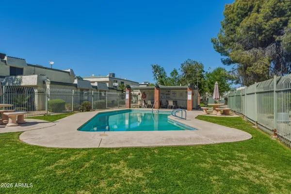 a view of a backyard with a patio