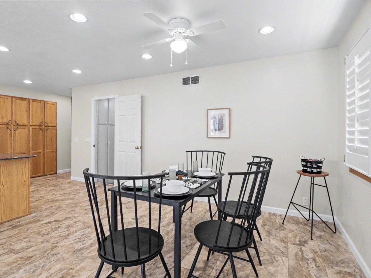 6455 Kensington Place Gilroy, CA 95020 - Photo 13 of 32 a view of a dining room with furniture