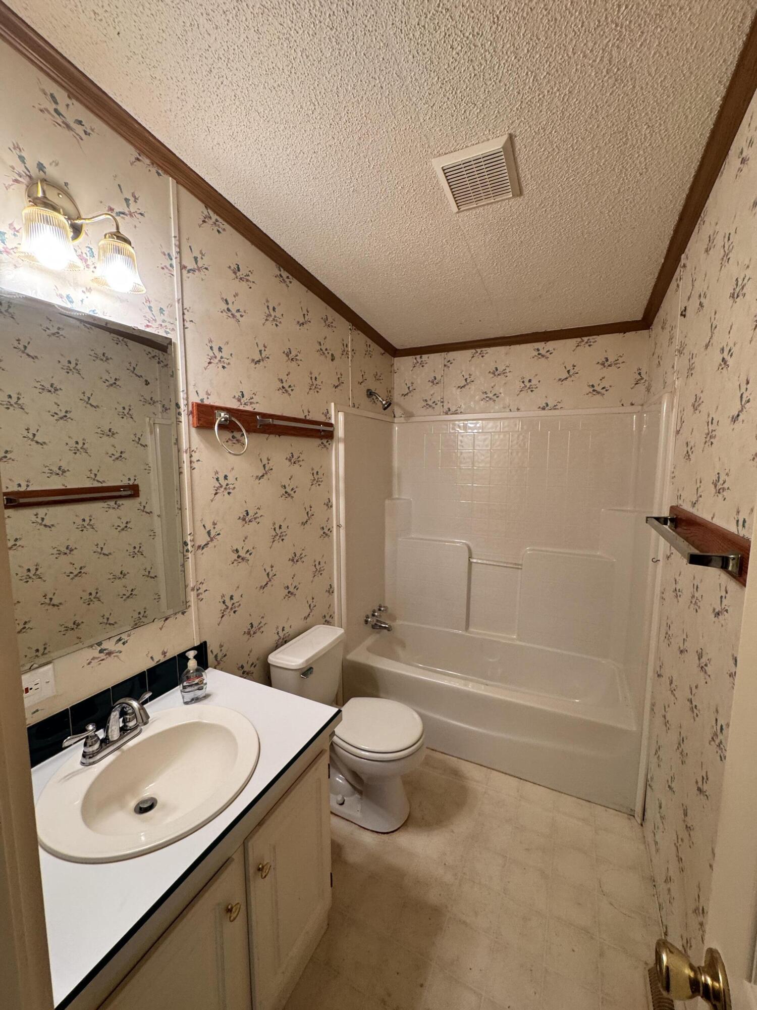 480 Glade Creek Road Glade Hill, VA 24092 - Photo 11 of 14 a bathroom with a sink toilet and shower
