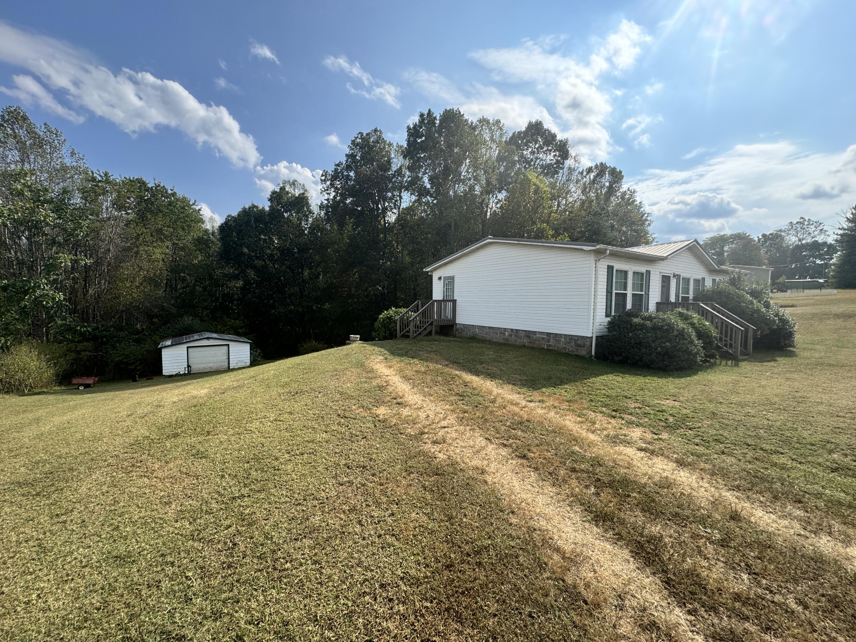 480 Glade Creek Road Glade Hill, VA 24092 - Photo 12 of 14 a view of a backyard of the house