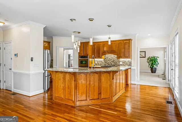 $705,000 | 23 Muirfield Court, Newnan, GA 30265