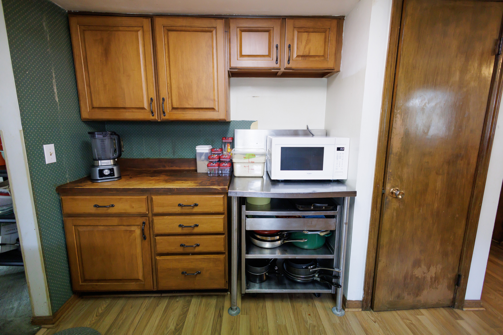 824 South McKinley Avenue Kankakee, IL 60901 - Photo 15 of 58 a kitchen with stainless steel appliances granite countertop a refrigerator and cabinets