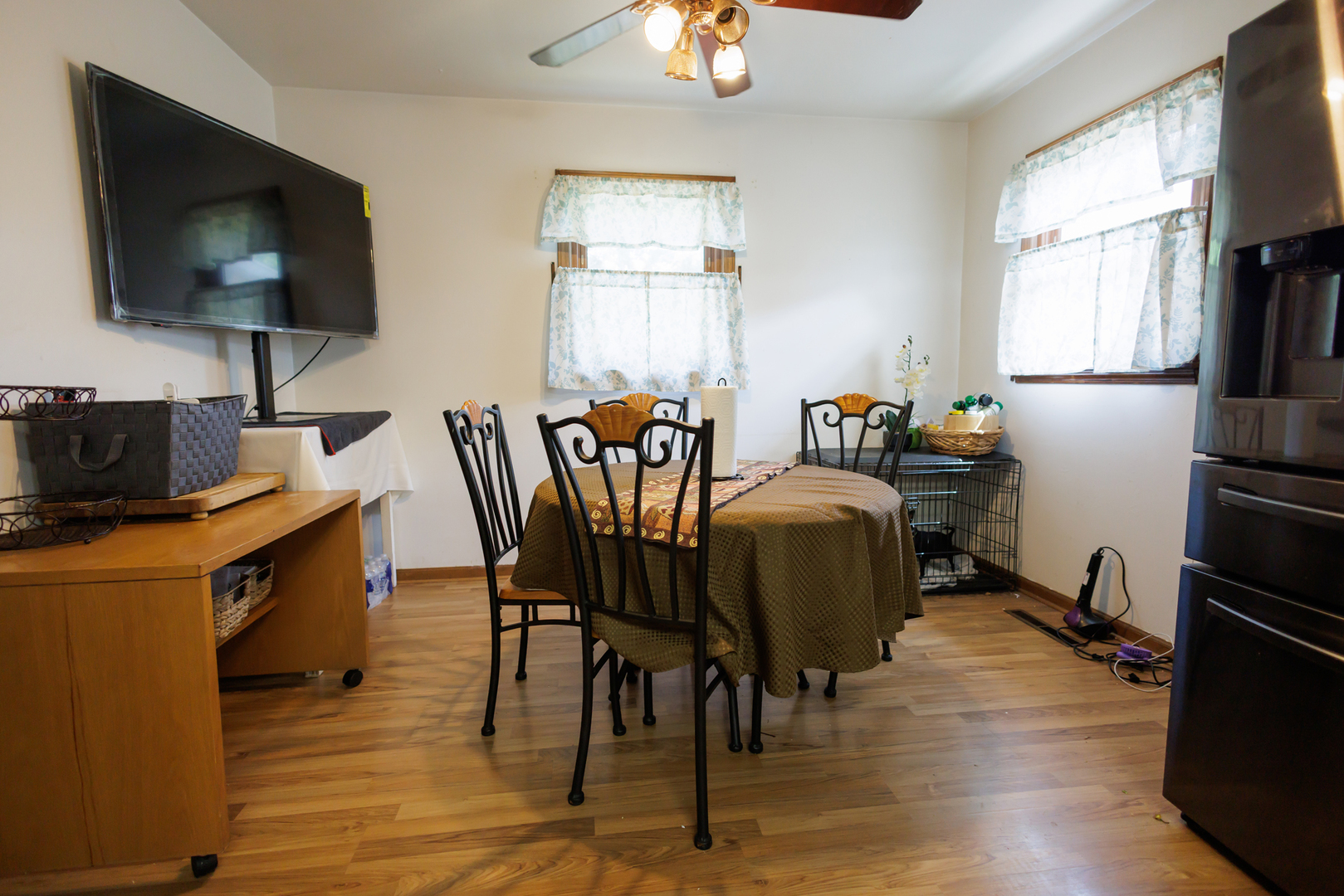 824 South McKinley Avenue Kankakee, IL 60901 - Photo 16 of 58 a view of a dining room with furniture window and wooden floor
