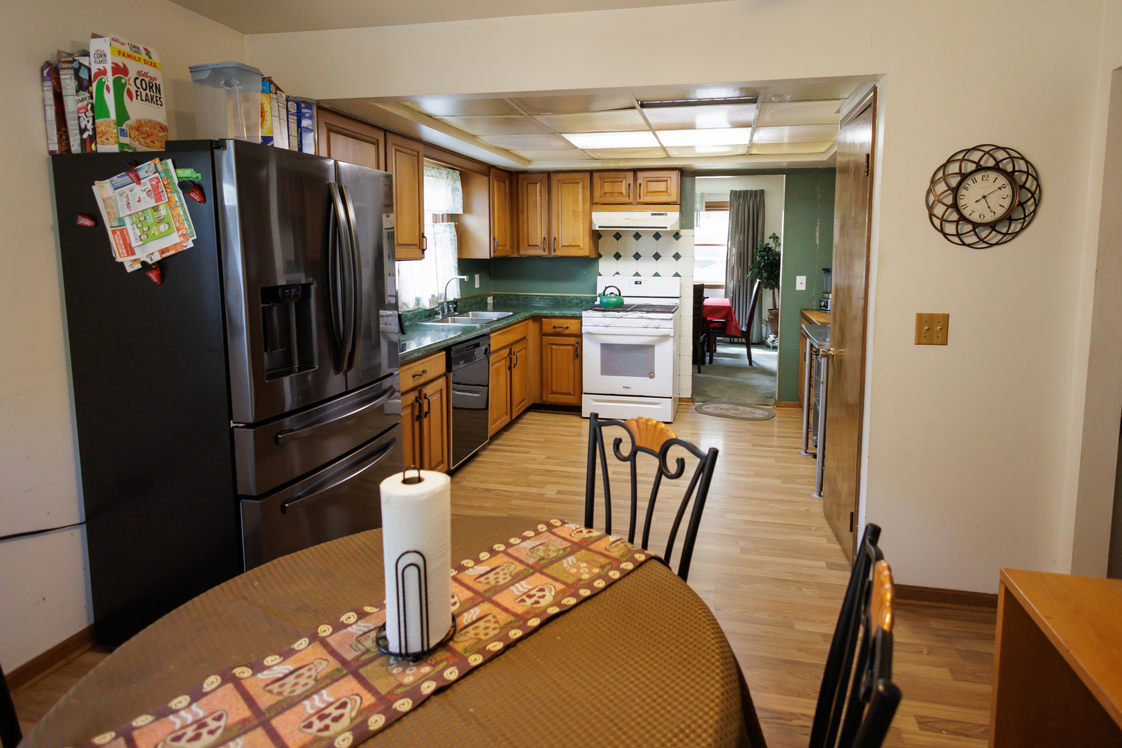 824 South McKinley Avenue Kankakee, IL 60901 - Photo 18 of 58 a kitchen with stainless steel appliances granite countertop a refrigerator and a stove