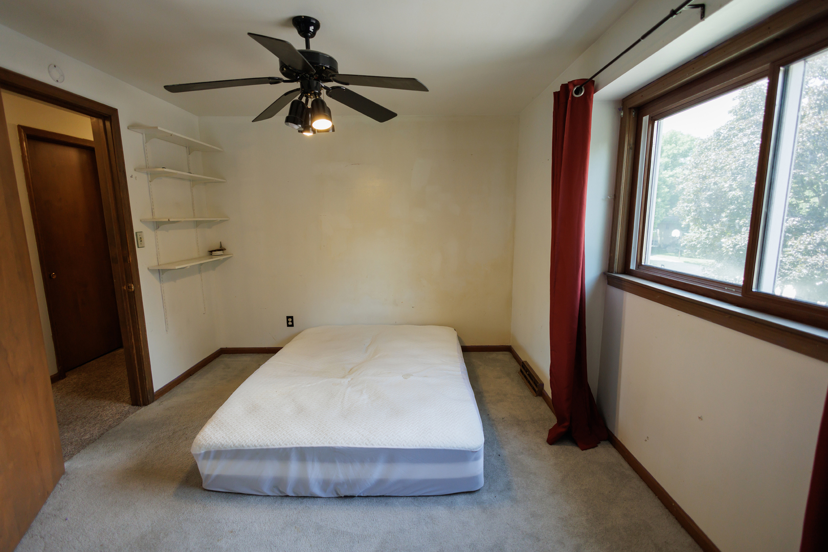 824 South McKinley Avenue Kankakee, IL 60901 - Photo 26 of 58 a bedroom with a bed and a window