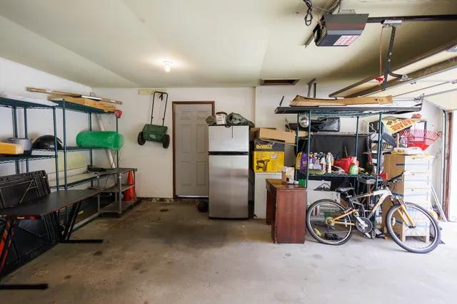 a view of backyard with sitting area