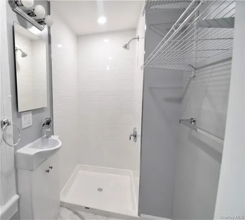 a bathroom with a bathtub and a sink