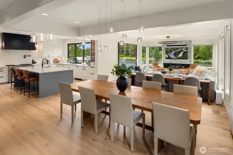a kitchen with sink a window and cabinets