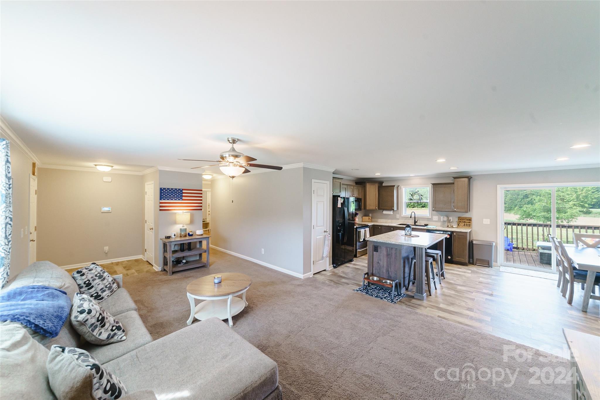 9405 Smith Road Kannapolis, NC 28081 - Photo 12 of 35 a living room with furniture and a large window