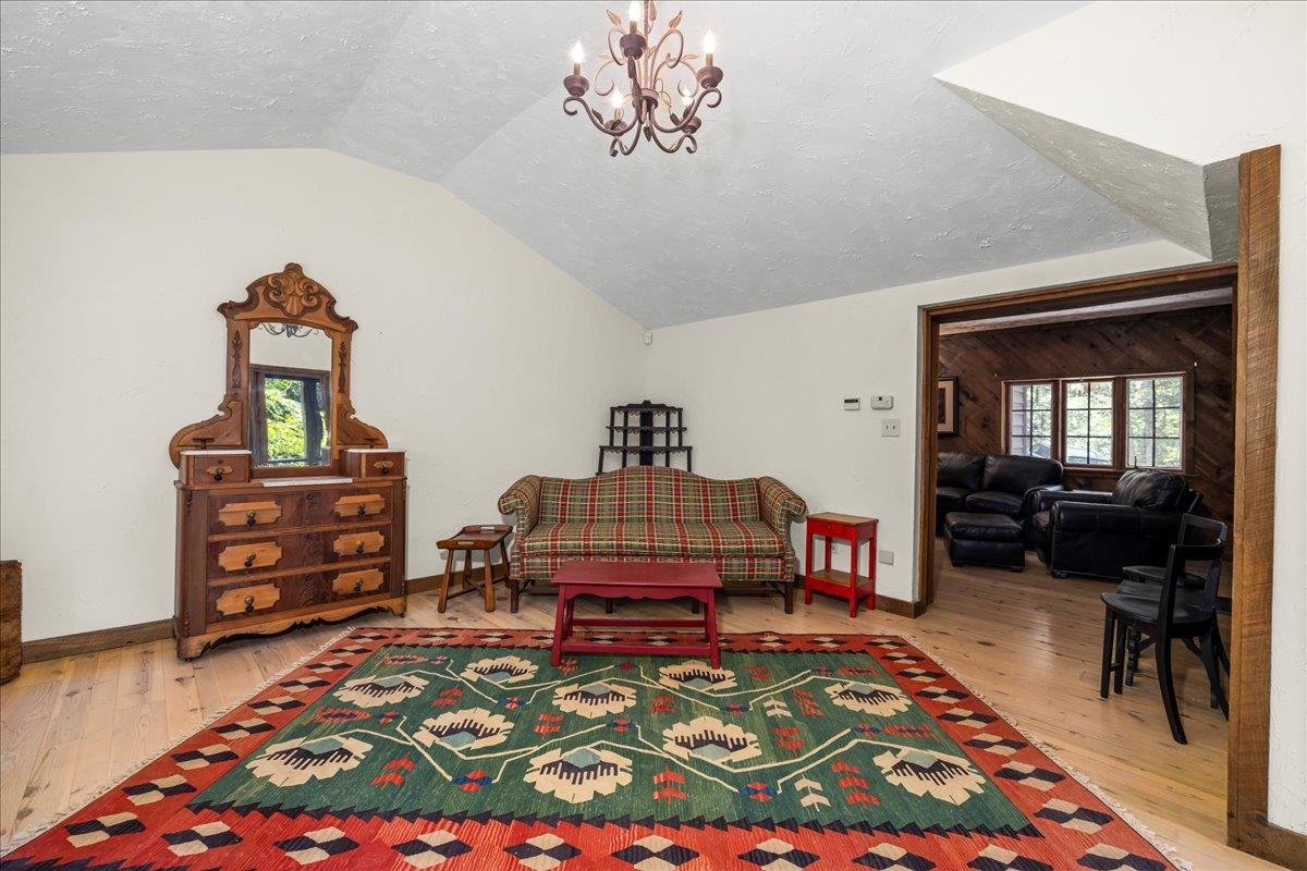 6614 Middlebrook Road Raphine, VA 24472 - Photo 14 of 52 a bedroom with furniture and a wooden floor
