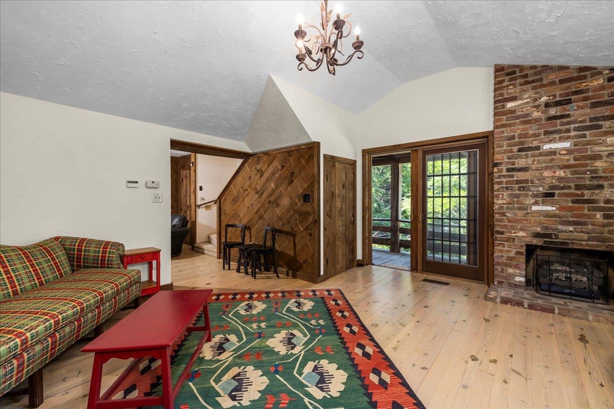 6614 Middlebrook Road Raphine, VA 24472 - Photo 15 of 52 a bedroom with furniture and a fireplace
