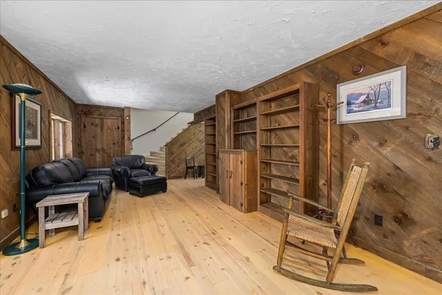 a bed room with a bed and furniture