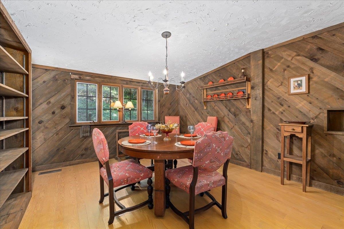 6614 Middlebrook Road Raphine, VA 24472 - Photo 19 of 52 a dining room with furniture a chandelier and window