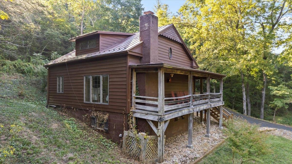 6614 Middlebrook Road Raphine, VA 24472 - Photo 2 of 52 a front view of a house with balcony and garden
