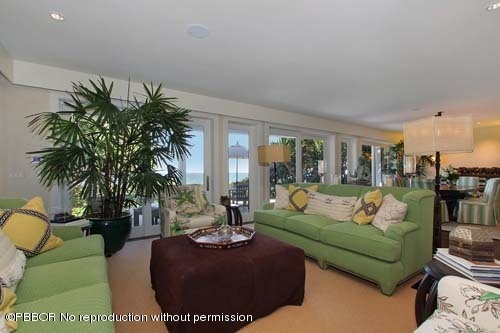 6195 North Ocean Boulevard Ocean Ridge, FL 33435 - Photo 6 of 12 a living room with furniture plant and a large window