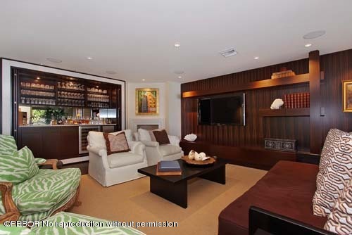 6195 North Ocean Boulevard Ocean Ridge, FL 33435 - Photo 7 of 12 a living room with furniture and a large window