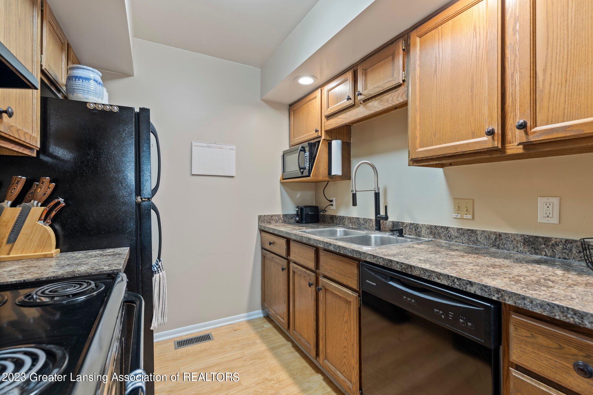 205 East Jolly Road, Unit 2 Lansing, MI 48910 - Photo 8 of 21 Kitchen