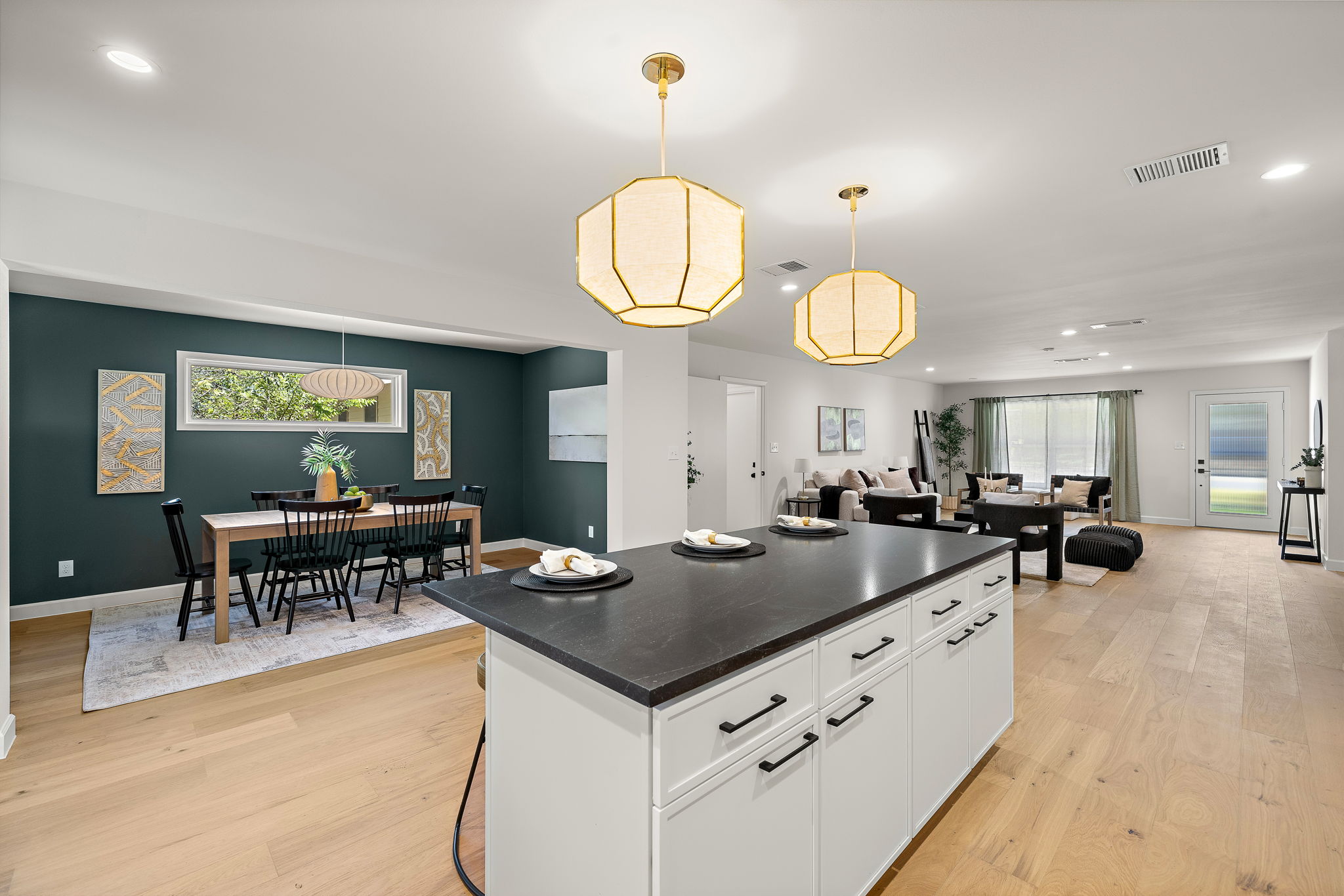 a kitchen with a table and chairs in it