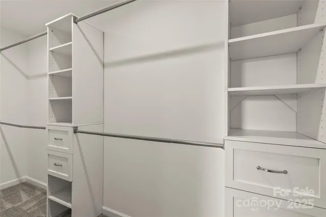 a view of a house with a roof deck