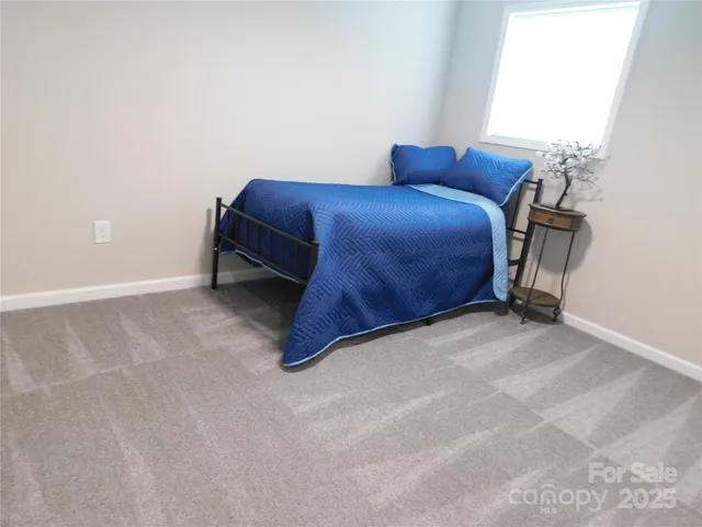 a balcony view with a seating space